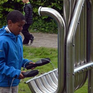 Diatonic Tembos Outdoor Music Instrument (boy playing; right side view)