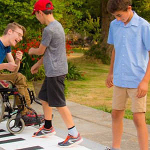 Grand Floor Piano Outdoor Music Instrument (2 boys playing)