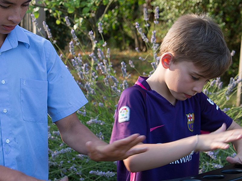 Handpipes Outdoor Music Instrument (2 boys playing)