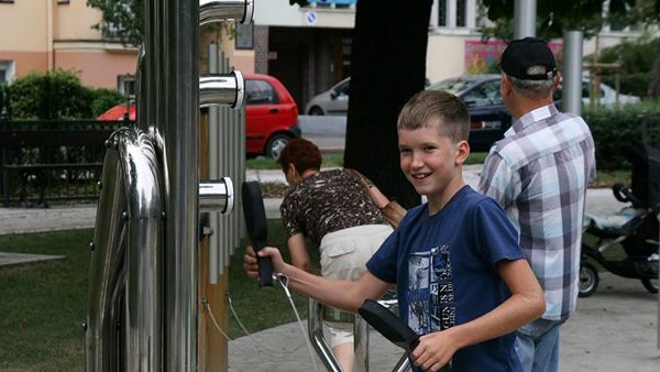 Pentatonic Tembos Outdoor Music Instrument (boy playing)