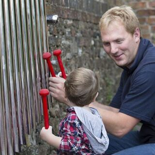 Percussion Play Mirror Chimes (1 child playing with father)