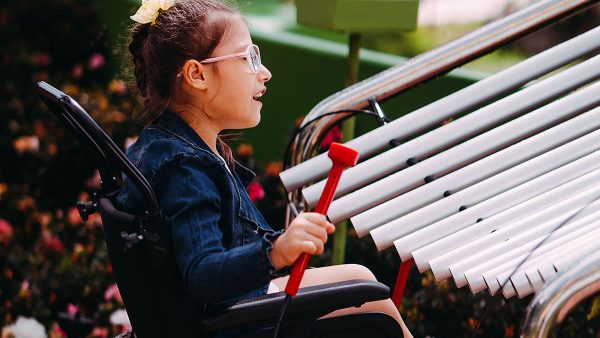 Percussion Play Papilio Bells (1 young woman in wheelchair playing)
