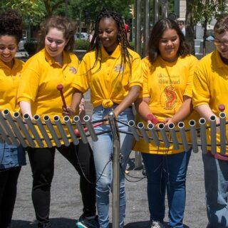 Percussion Play Papilio Bells (4 young women, and 1 young man playing)