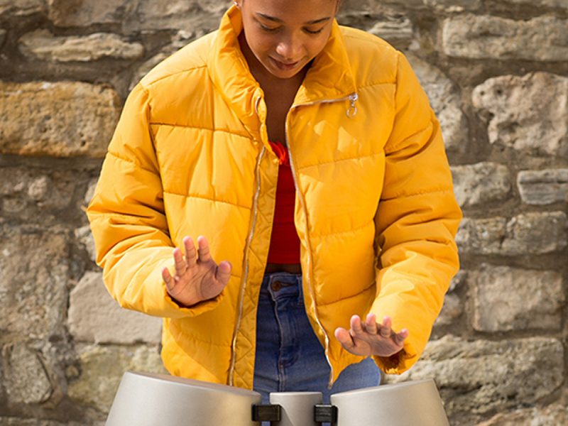 Percussion Play Tumbadoras (young woman playing)