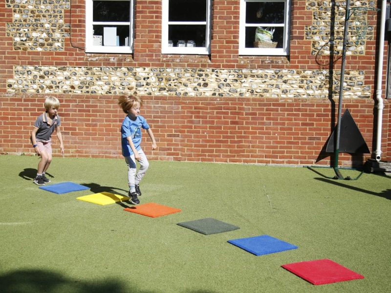 Stepping Stones Outdoor Music Instrument (2 boys playing)