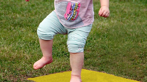 Stepping Stones Outdoor Music Instrument (toddler jumping; chord E in yellow)