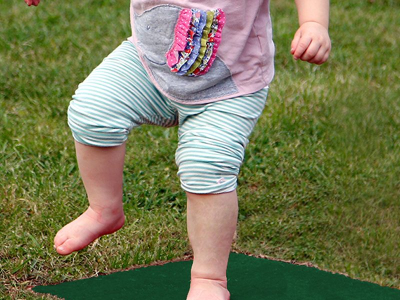 Stepping Stones Outdoor Music Instrument (toddler jumping; chord F in green)