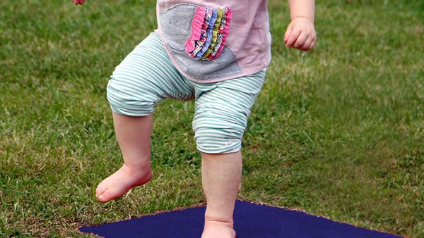 Stepping Stones Outdoor Music Instrument (toddler jumping; chord G in blue)