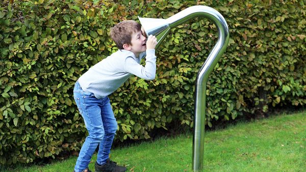 Talk Tubes Outdoor Music Instrument (boy listening)