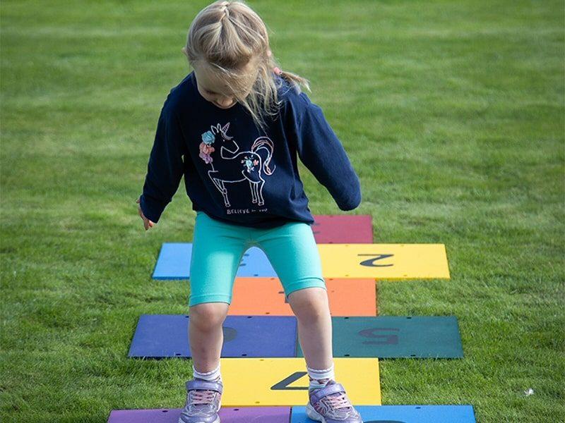 Harmony Hop Ooutdoor Music Instrument (young girl landing)